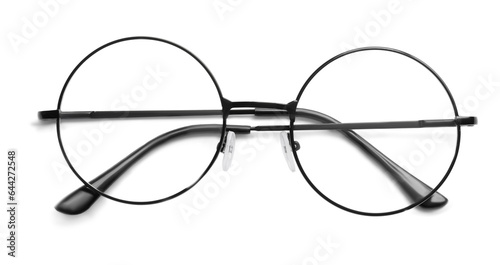 Round glasses with black frame on white background, top view
