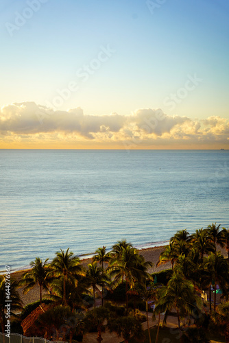 pastel colors of the calm ocean at sunrise