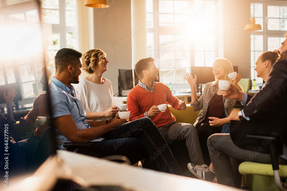 Young and diverse group of people having a meeting after work in the startup company office