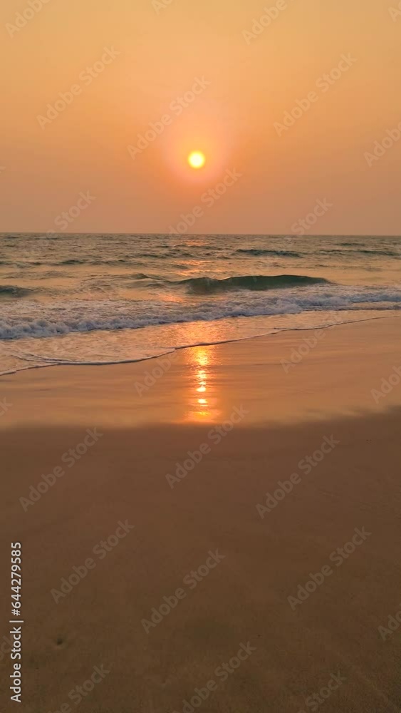 Sunset at the beach of the tropical island Koh Lanta Krabi Thailand, evening on the beach calm scenery with a orange sky Sunset at the beach of the tropical island Koh Lanta Krabi Thailand, evening on the beach calm scenery with a orange sky
