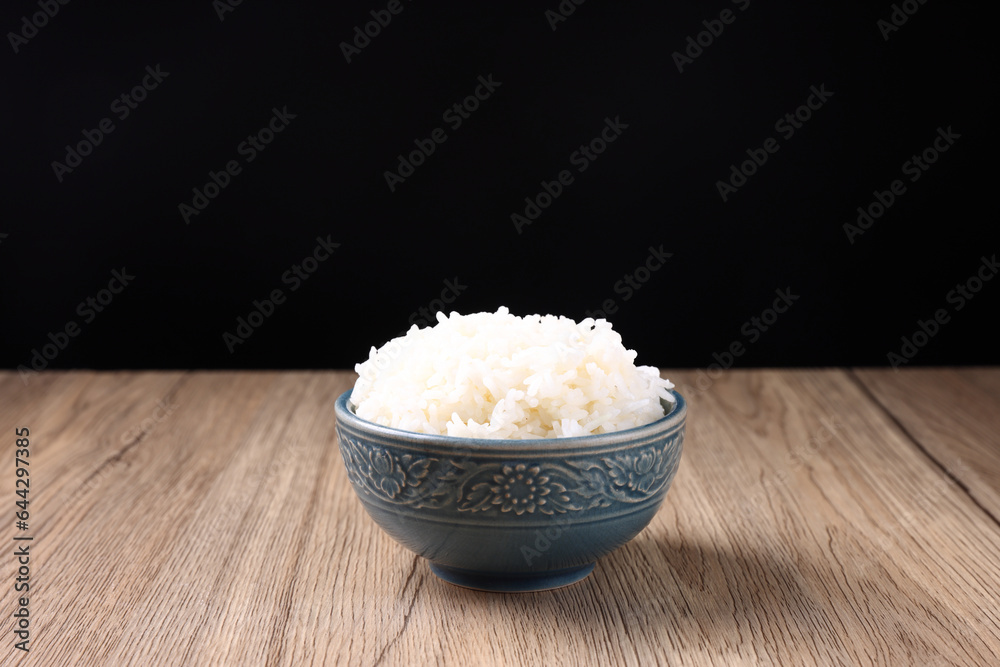 Thai rice isolated on wood background Thai rice isolated on wood background