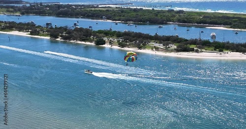 Para Sailing on the beautiful Gold Coast of Australia, Glistening summers day, Drone footage