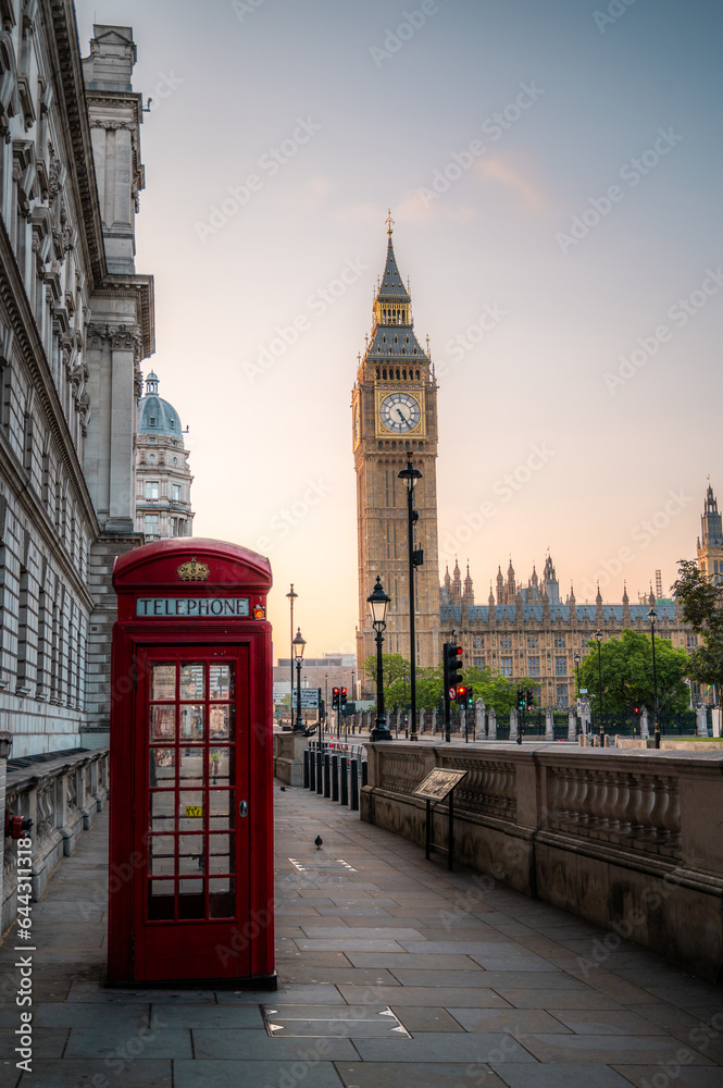 Obraz premium Traditional red british telephone box with Big Ben at sunrise London, UK. Travelling concept. London landmarks