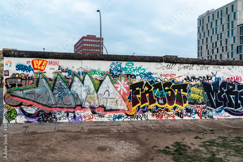 Berlin, Germany: April 21, 2022: Art and drawings on the Berlin wall.