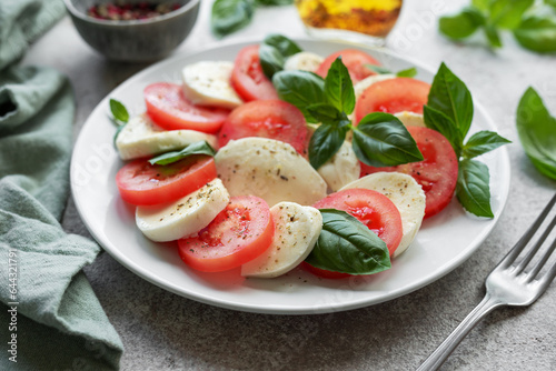 Caprese salad with tomatoes, mozzarella and basil.
