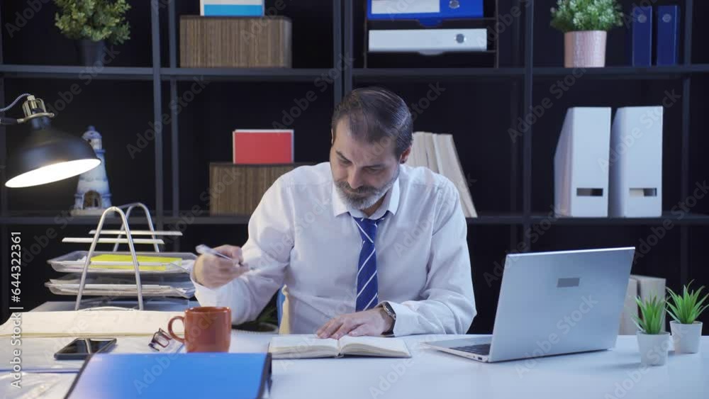 Businessman is stressed and thinking about a very important job. Businessman is stressed and thinking about a very important job.