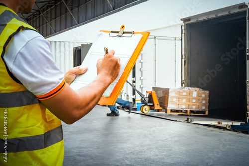 Worker Holds a Clipboard Checking the Loading Package Boxes at Distribution Warehouse. Delivery Shipment to Customers. Supplies Warehouse Shipping, Freight Truck Logistic Transport.
