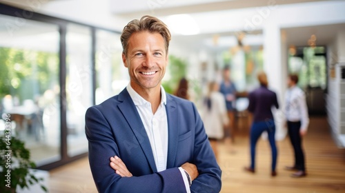 Portrait of a male real estate agent at a bustling real estate agency tirelessly matching clients with their dream homes photo
