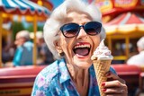 senior woman eating ice cream at amusement park