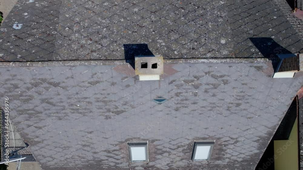 Top View Of An Eternit Roof With Chimney In A Residential Architecture. Aerial Drone Shot Top View Of An Eternit Roof With Chimney In A Residential Architecture. Aerial Drone Shot