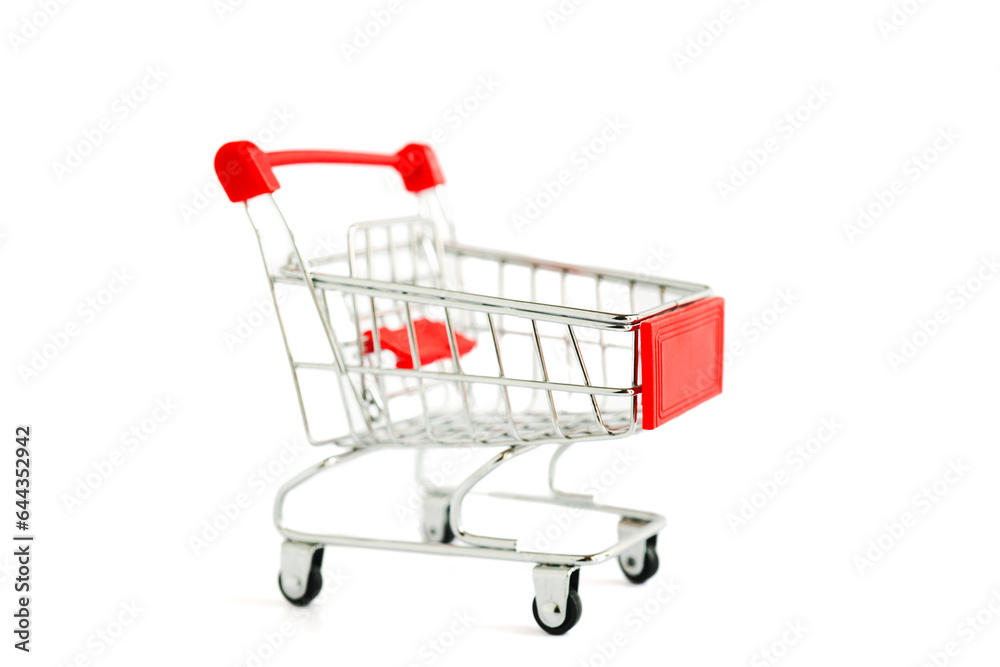 Shopping cart with red handle isolated on white background  in soft focus