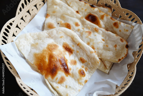 Tandoori butter Naan is a traditional soft Indian flatbread made in the tandoori oven.