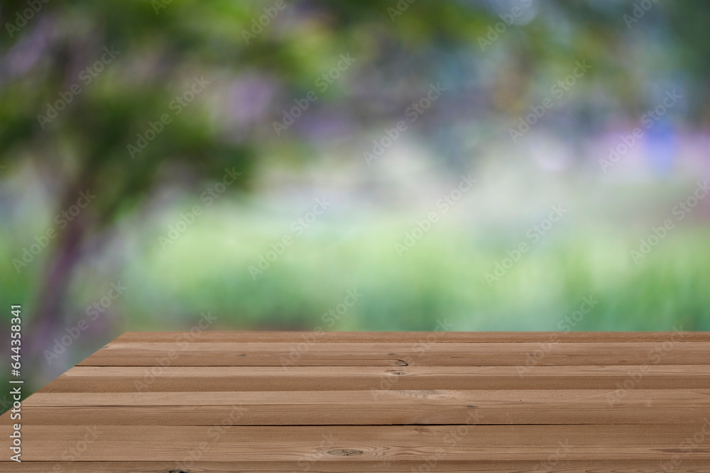 wooden table with bokeh garden background wooden table with bokeh garden background
