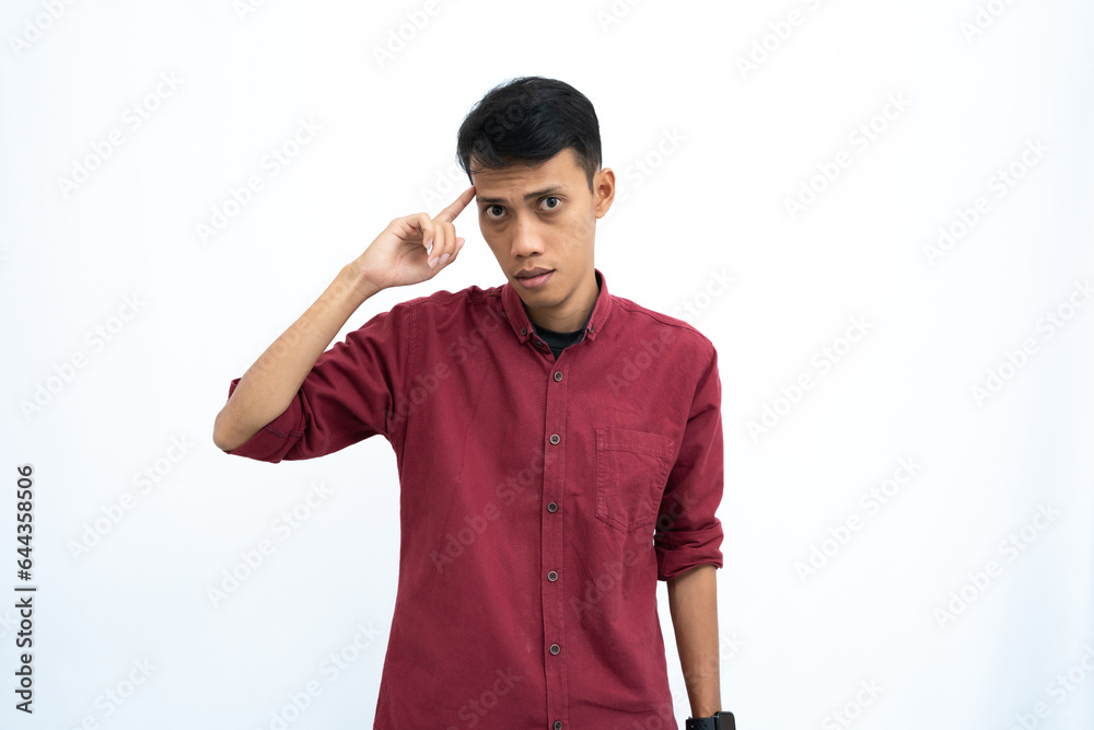 asian man, business or student concept wearing red casual shirt thinking pose, looking for ideas, getting ideas, confused. Isolated white background. asian man, business or student concept wearing red casual shirt thinking pose, looking for ideas, getting ideas, confused. Isolated white background.
