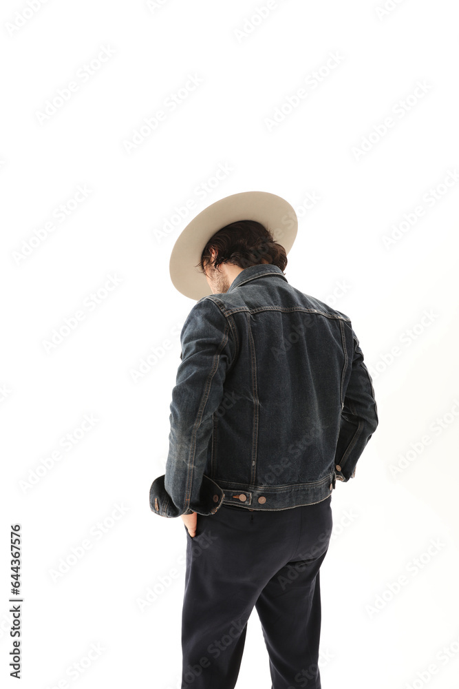 Back view portrait of Caucasian man on white background wearing fedora hat. Back view portrait of Caucasian man on white background wearing fedora hat.