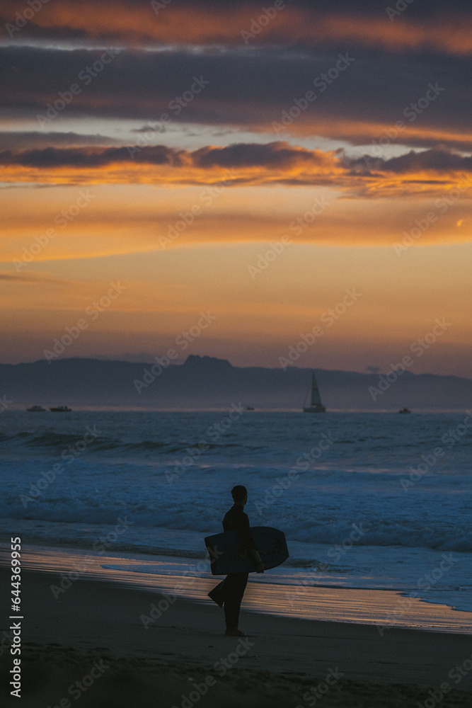 silhouette of a person on the beach