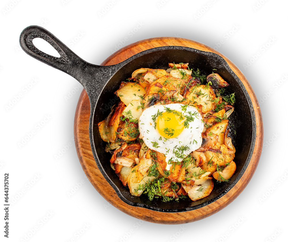 Fried potatoes with wild mushrooms and egg. In a cast iron skillet. Isolated image on white background.