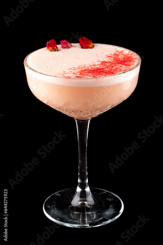 A deliciously cocktail with different fillings. Isolated on a dark background