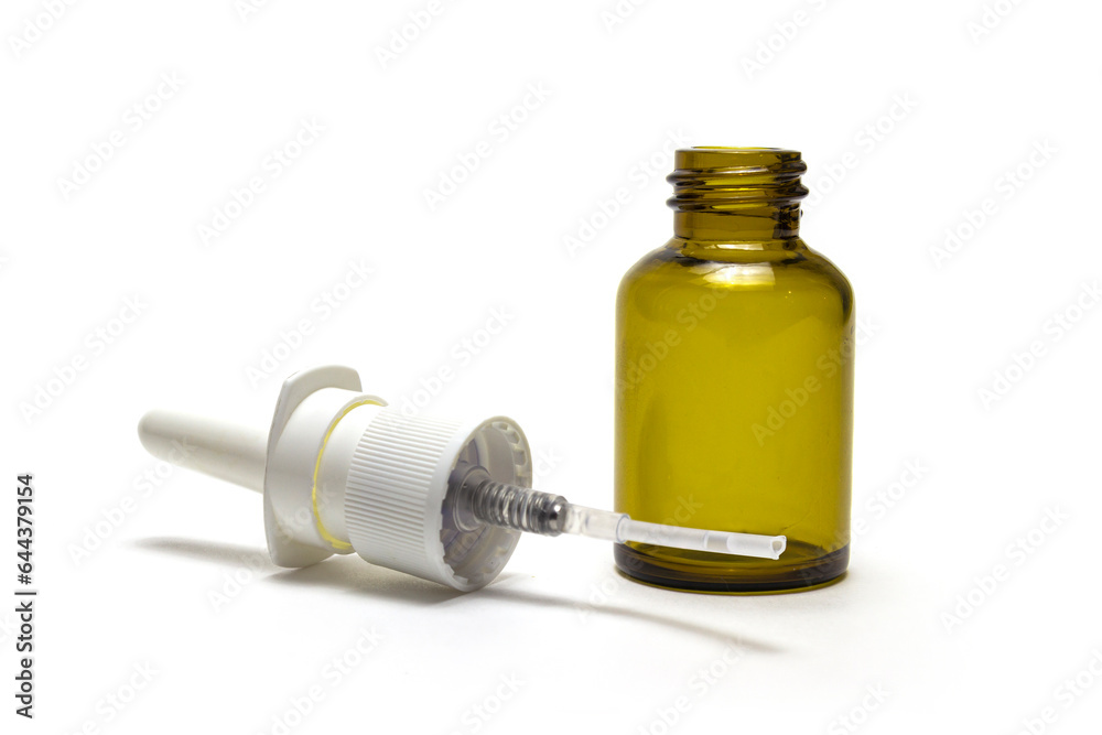 Bottles with drops and spray nasal drops isolated on white background. Bottles with drops and spray nasal drops isolated on white background.