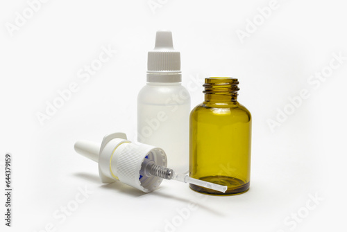 Bottles with drops and spray nasal drops isolated on white background.