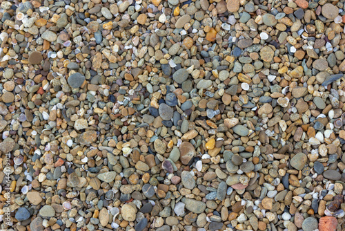 Abstract background texture, Colorful sea stones in water, top view