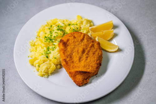 Chicken cutlet with couscous and lemon