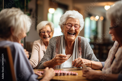 Seniors Find Joy in Playing Cards, Sharing Laughter, and Building Camaraderie in a Warm Retirement Nursing Home Atmosphere. created with Generative AI