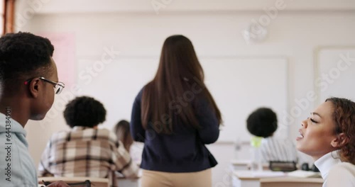 Phone, students and distraction with a teacher in a classroom for discipline during a lesson. Funny, social media or meme with friends laughing and an angry professor in class to confiscate a mobile photo