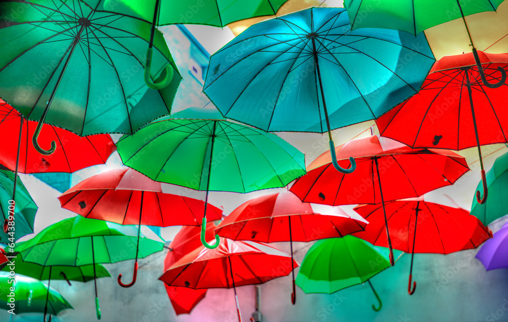 open umbrellas to color a gray rainy autumn