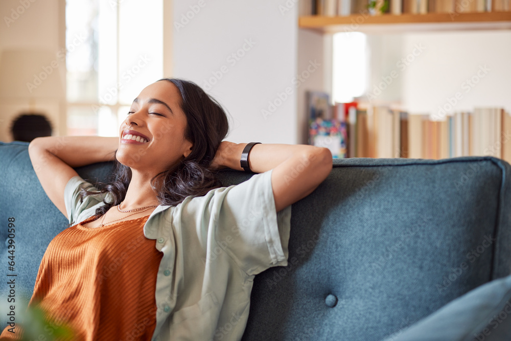 Smiling multiethnic woman relaxing at home with copy space - obrazy, fototapety, plakaty 