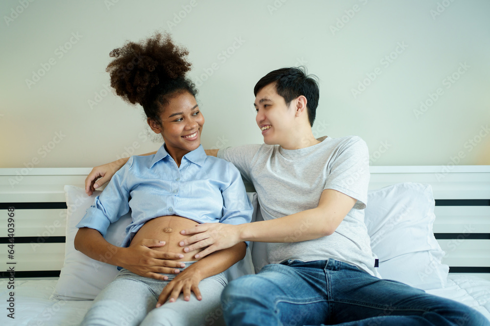 American African black ethnicity woman and her Asian husband relaxing