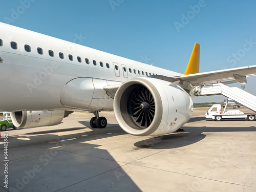 Commercial passenger plane waiting for passengers to arrive on the apron