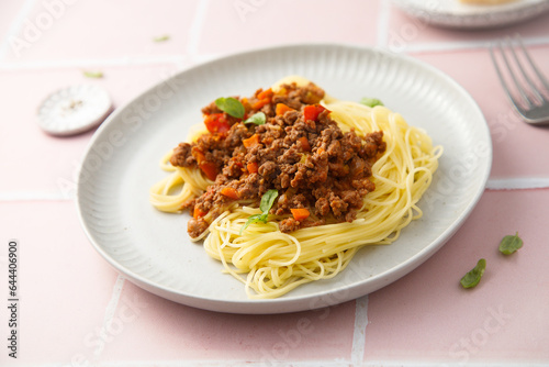 Traditional spaghetti Bolognese with fresh basil