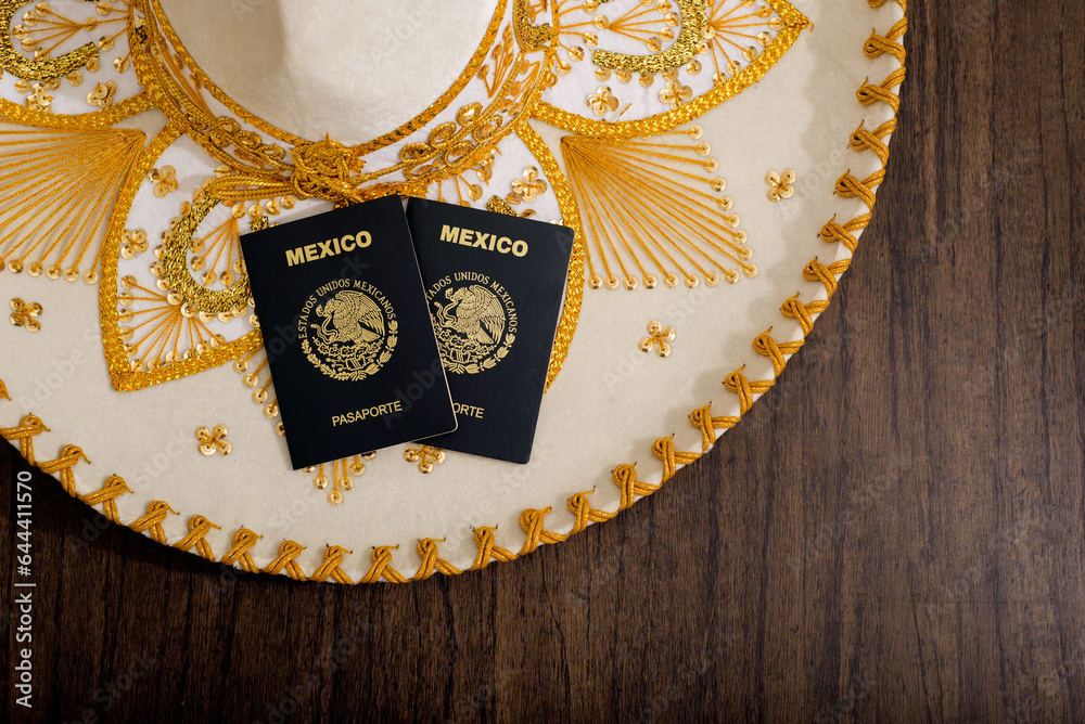 Mexican passport on charro hat. Mariachi hat and Mexican passport
