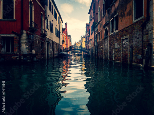 Fototapeta A narrow canal in Venice. Scenic colorful view in Venice, Italy.