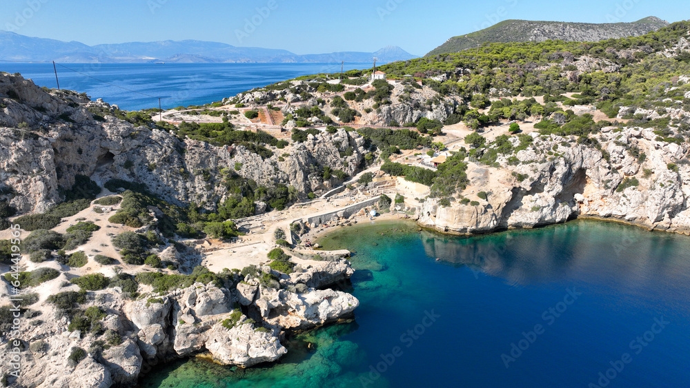 Aerial drone photo of iconic archaeological site of Heraion built by the sea forming a small secluded beach,near lake Vouliagmeni, Loutraki, Perachora, Greece