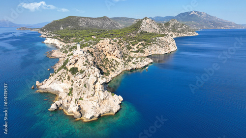 Aerial drone photo of beautiful and picturesque cape Melagavi forming a small peninsula with unique lighthouse stand out next to archaeological site of Heraion, Loutraki, Greece photo