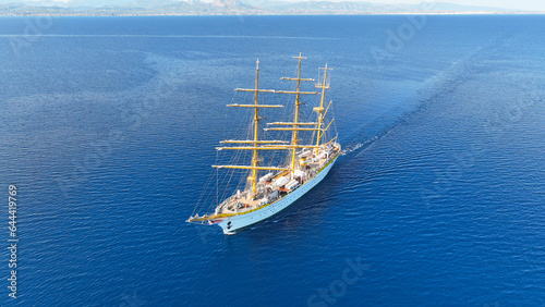 Aerial drone photo of classic wooden sail boat cruising in deep blue Mediterranean calm sea