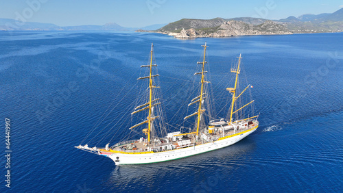 Aerial drone photo of classic wooden sail boat cruising in deep blue Mediterranean calm sea