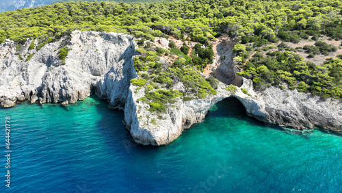 Aerial drone photo of secluded paradise emerald cave and beach called cave of the seals in Perachora  Corinthia  Greece