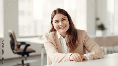 A joyful plus-size woman in a wheelchair smiles at work with colleagues in an office. Generative AI