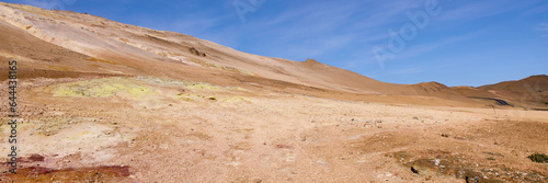 Hverir, Iceland. A surreal, bare orangy-red, geothermal area at the foot of Namafjall. Full of fumaroles, mud pools, steam vents. It's on Route 1. It is also called Namaskard Hverir.