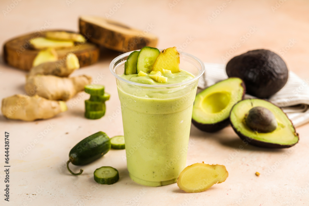 Super Green Detox juice include avocado, cucumber, ginger and mint served in glass isolated on table top view healthy weight loss morning drink Super Green Detox juice include avocado, cucumber, ginger and mint served in glass isolated on table top view healthy weight loss morning drink