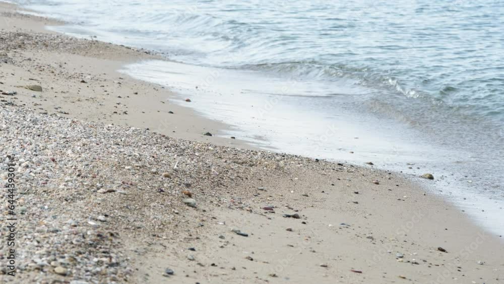 Beach. small waves on a beach on a sunny summer day. detail. 4k video, 50 fps. Beach. small waves on a beach on a sunny summer day. detail. 4k video, 50 fps.