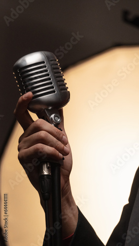 singer with microphone in hand