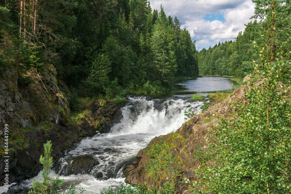 natural landscape with a clear waterfall on a forest water natural landscape with a clear waterfall on a forest water