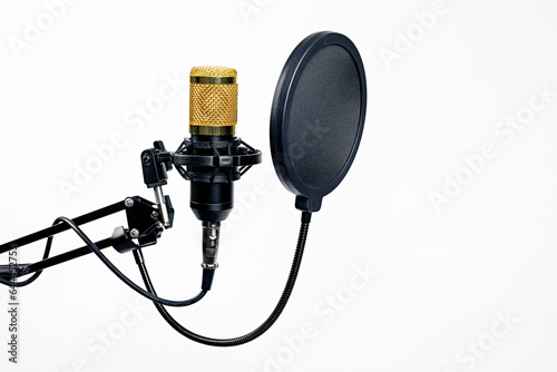 Professional studio recording microphone with pop filter isolated on white background