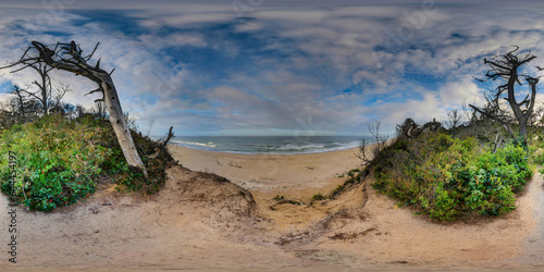 360 by 180-degree seamless panorama view of the Cape Cod National Sea Shore. In the summer, with a blue sky and clouds. High-resolution panorama.