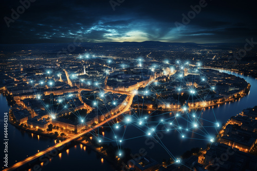 Aerial view of buildings city at night with internet network connection.