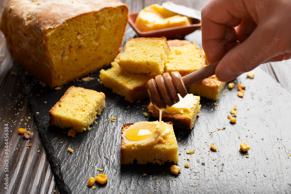Sweet Honey Butter homemade cornbread slices on kitchen table